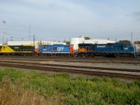 SAR C39-8 7487, GTW GP9 4520, and ARN B30-7 1007 parked in the deadline at CN's Walker Yard.