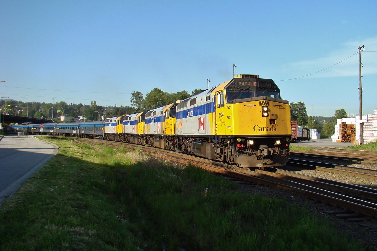 VIA 6424, 6435, 6446 and 6436 lead the eastbound Canadian into New Westminster.