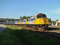 VIA 6424, 6435, 6446 and 6436 lead the eastbound Canadian into New Westminster.