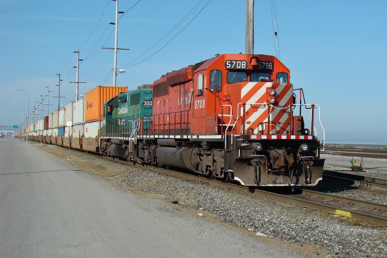 CP SD40-2 5708 along with GP38AC 3005 idle at the east end of Roberts Bank.