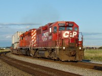 GP38AC 3007 and SD40-2 5796 lead an intermodal transfer into the Port of Vancouver's Deltaport.