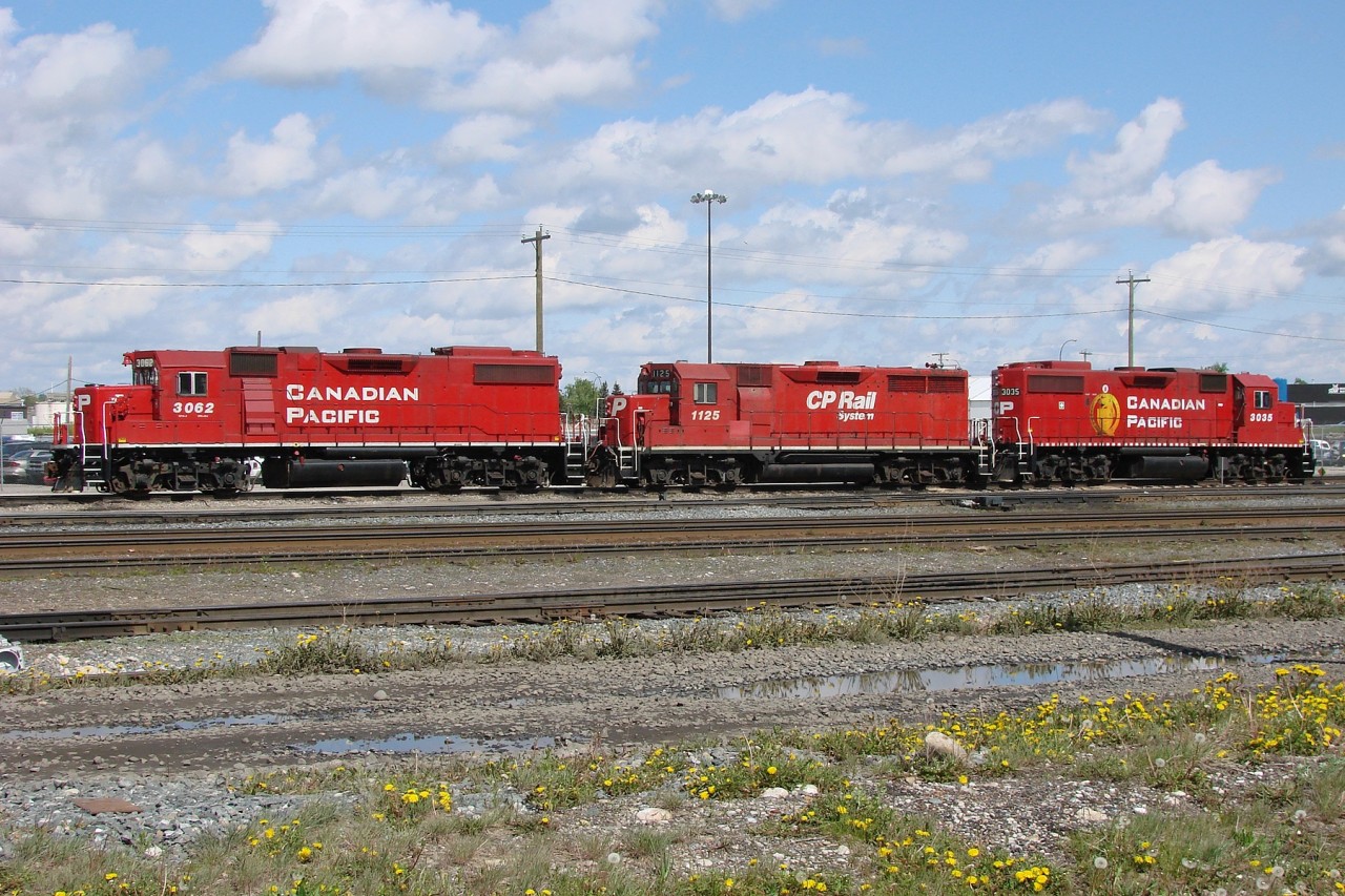 GP38-2's 3062 and 3035 with GP35 Control Cab 1125 parked at Alyth Yard.