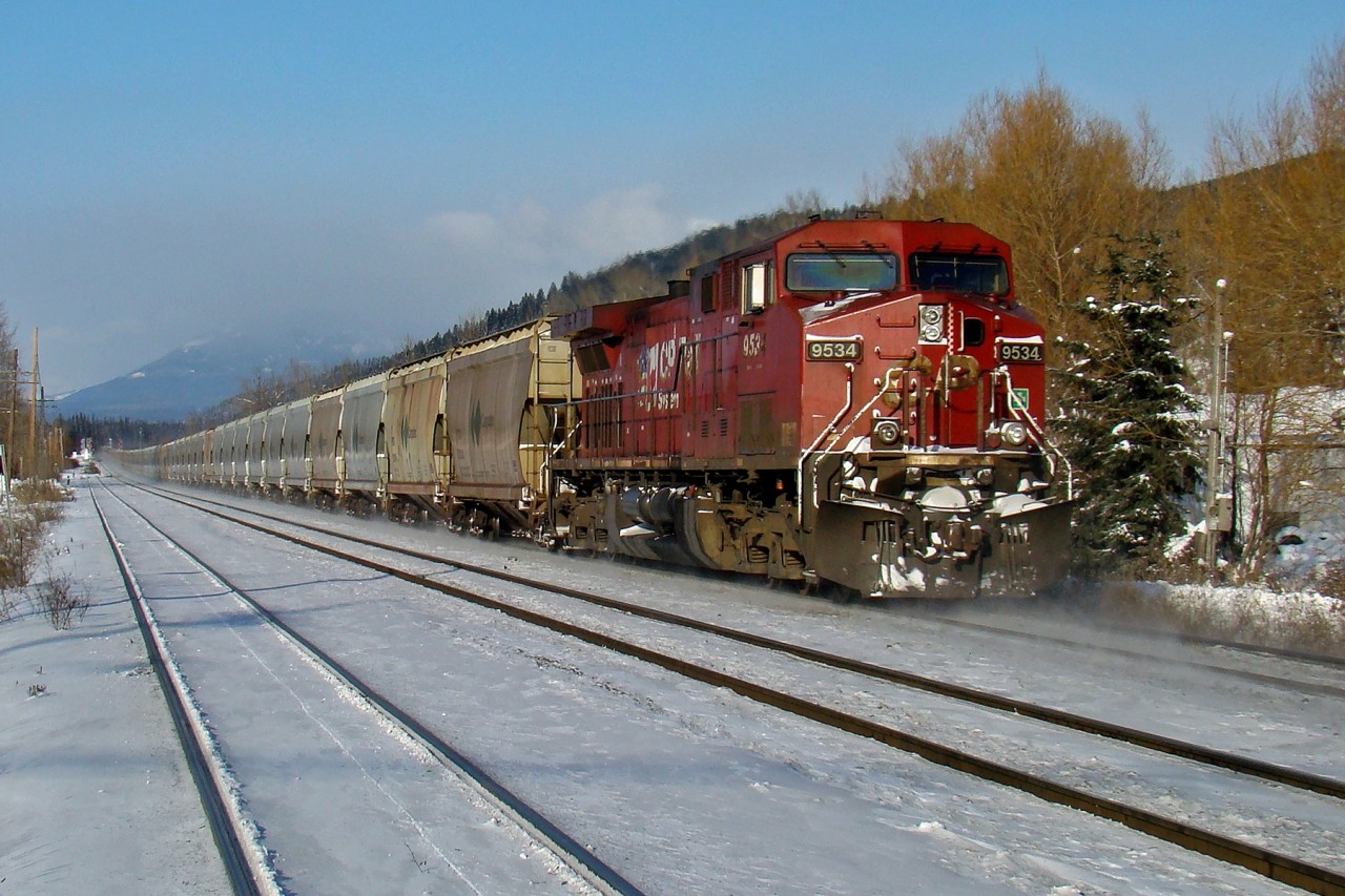 After refueling in Golden, the DPU of a Vancouver bound Canpotex Potash train kicks up snow as it accelerates towards KC Junction.