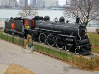 Canadian National Railway 4-6-2 Pacific-type steam locomotive on display at Riverside Park in Windsor, ON, Detroit River & skyline in background. Built in 1911 by CN's Point St. Charles Shops, with 73 inch drivers & 33,630 pounds of tractive effort.  For more pics & videos from my collection see my website at <a href="http://northamericabyrail.info"> http://northamericabyrail.info </a> (New trips added)