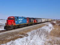  CN 439 approaches the crossing at Pump Road on it's approach to Jeannettes Creek with GTW 4927 on the point.