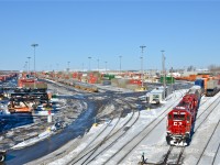 CP 4452 & CP 3124 do some switching at Lachine Intermodal Yard on a cold but sunny morning. For more train photos, click <a href=http://www.flickr.com/photos/mtlwestrailfan/>here.</a>