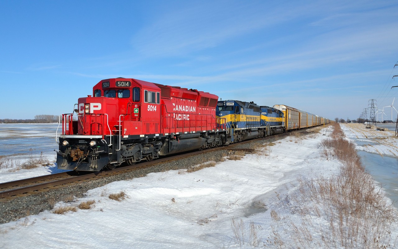 CP 235 heads westbound thru St Joachim mile with new SD30C-ECO 5014 on the point with a pair of ICE units trailing.