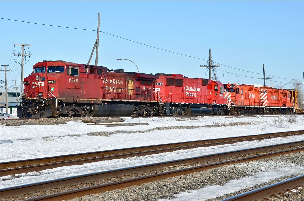 Last two CP GP9's leave Montreal. What are reputedly the last two CP GP9's in Montreal (CP 8234 & CP 8231) are tucked in behind CP 9635 & CP 6256 on CP 119, westbound at Dorval after holding for an eastbound AMT commutertrain. For more train photos, click here.