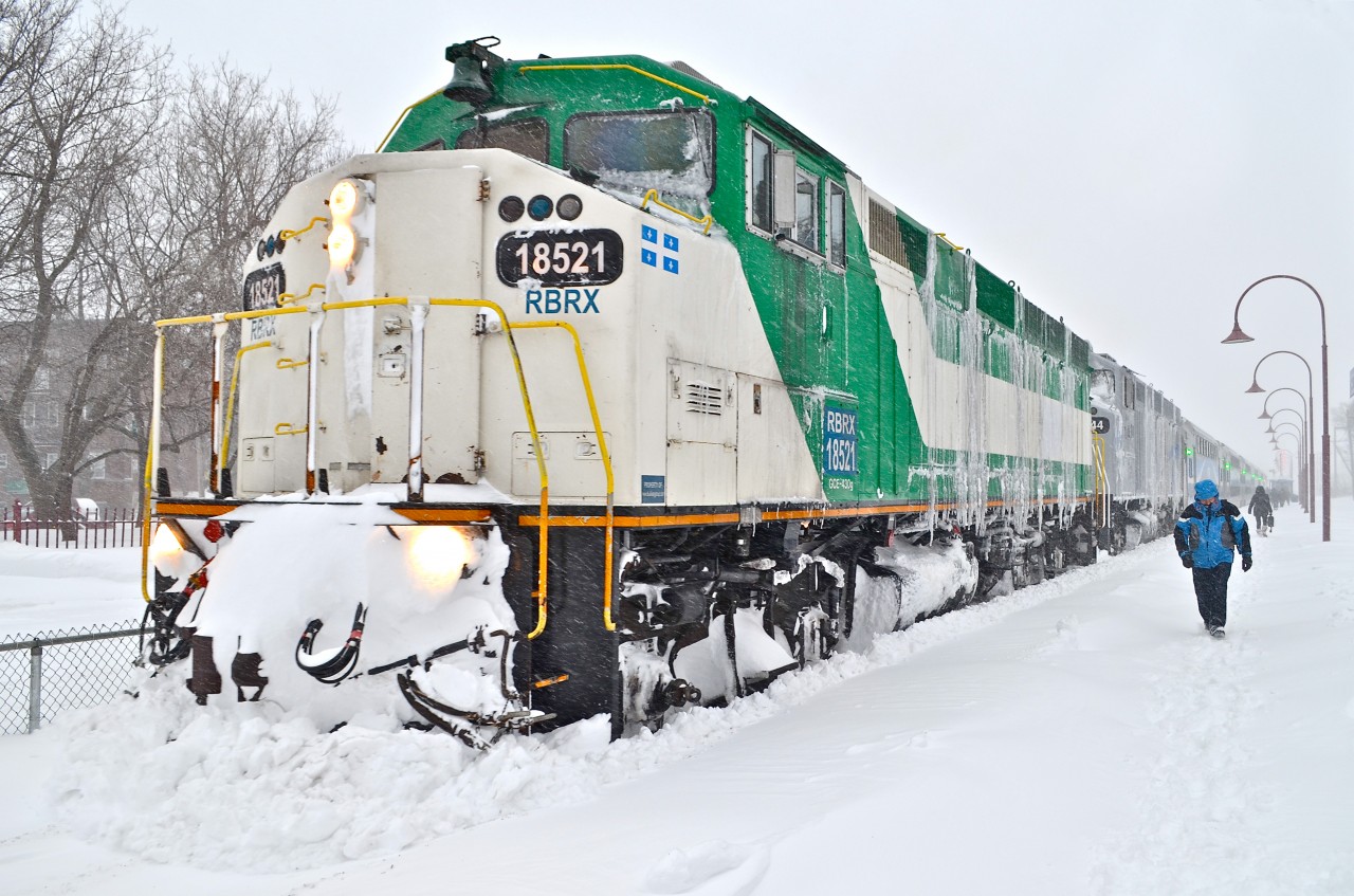 AMT 24 makes its way into Montreal West, led by two ice covered ex-GO Transit F59PH's: RBRX 18521 & AMX 1344. For more train photos, click here.