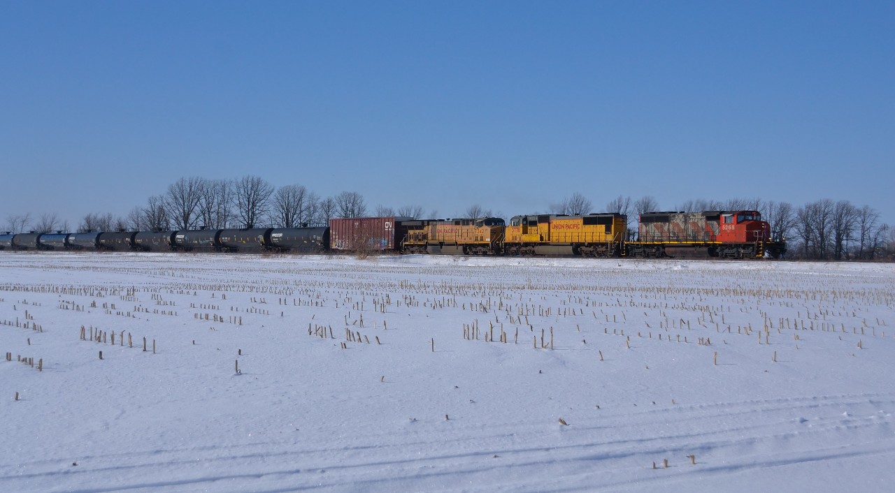 CN 382 heads eastbound out of Sarnia with a nice combo of CN/UP power