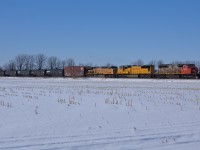 CN 382 heads eastbound out of Sarnia with a nice combo of CN/UP power
