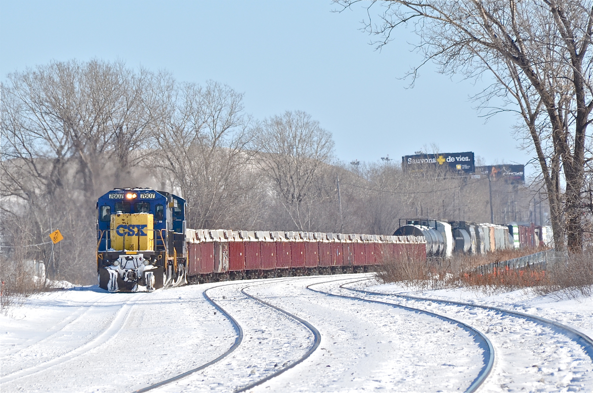 CSXT 7607 & CSXT 241 are about to pass Dorval Station with CN 327. For more train photos, click here.