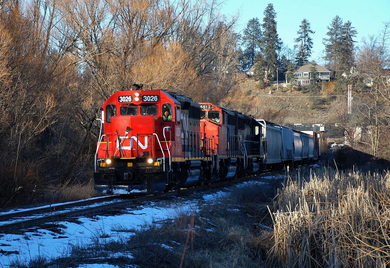 The pick-up freight from Kamloops has just passed through the yard in Vernon and is headed south with CN(WC)3026 in the lead.
