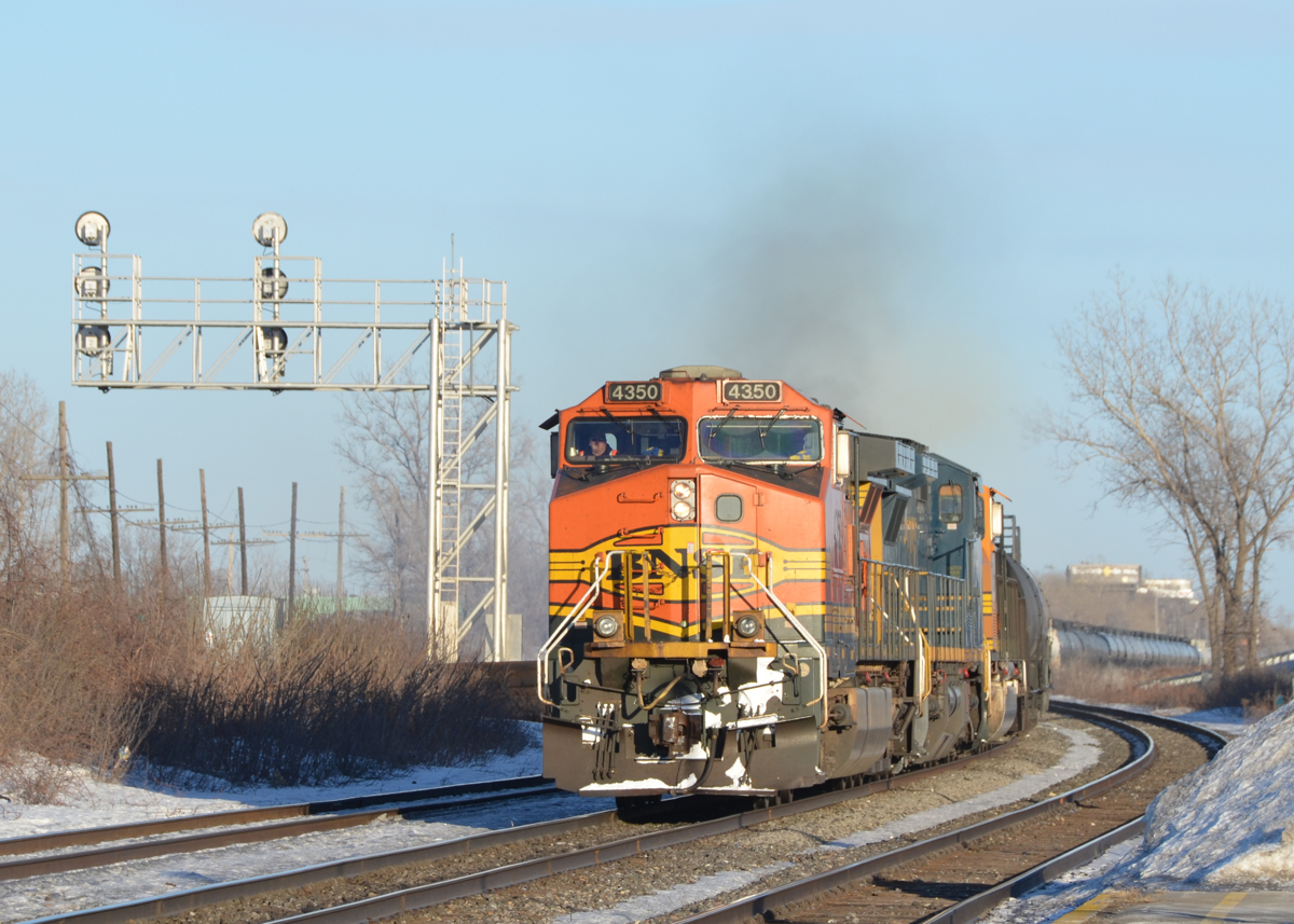 As is becoming commonplace, foreign power that came into Montreal on CN 720 (loaded oil train) is seen leaving on CN 377. Lashup was BNSF 4350, CSXT 7743 & BNSF 8851. This train was delayed at Taschereau Yard for a few hours and so was really moving. For more train photos, click here.
