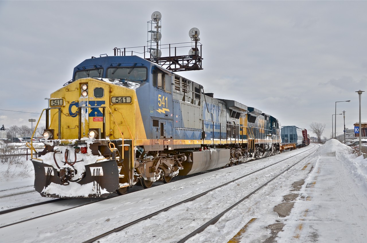 CSXT 541 & CSXT 7509 head west through Dorval with CN 327. This train will get a CSX crew at Huntingdon, Quebec and cross into the U.S. soon afterwards. For more train photos, click here.