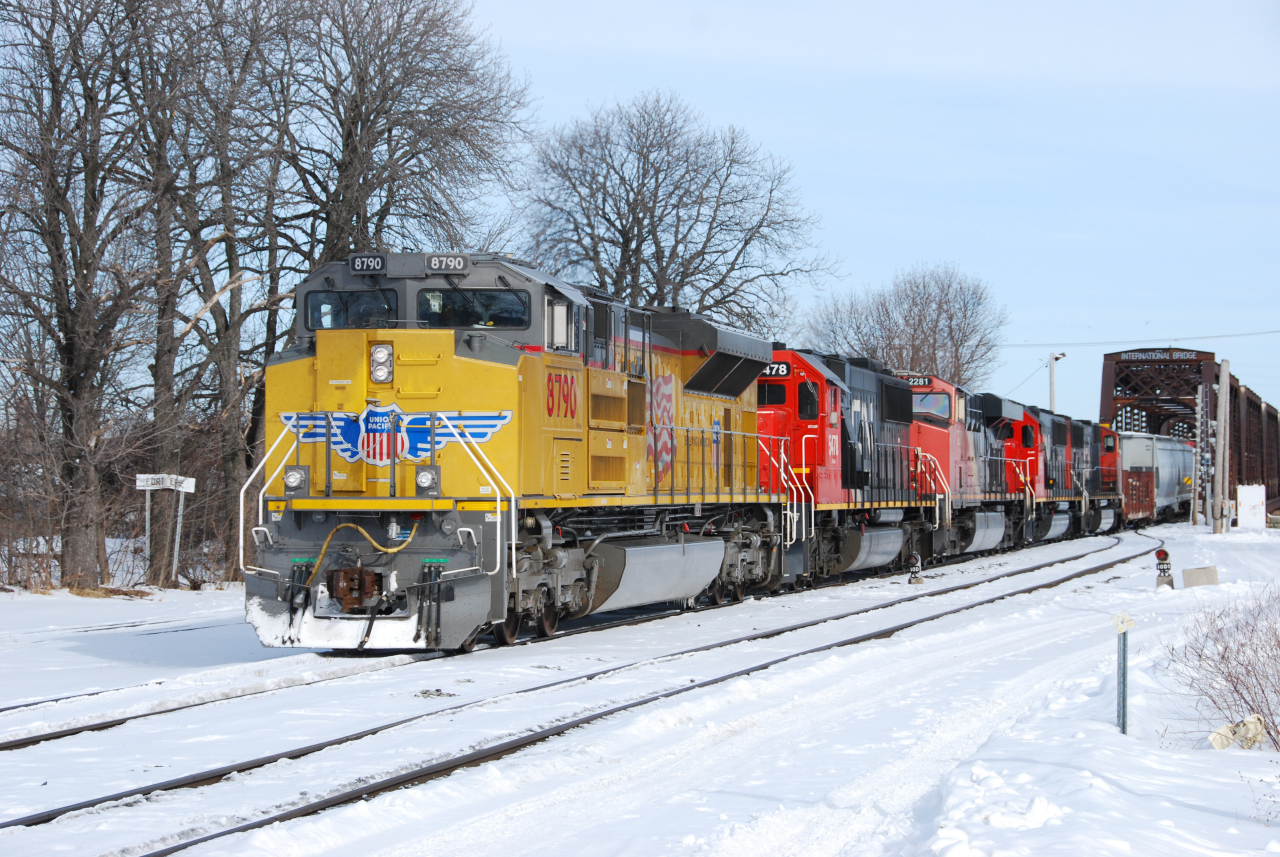 The daily NS transfer from Buffalo to CN Fort Erie arrives in Ontario with a UP unit leading 4 CN units to be returned to their rightful owner.