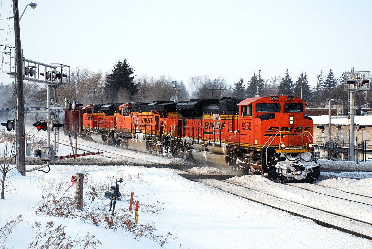 CN U720 with BNSF 9255, BNSF 6031 and BNSF 9246 cross Hardy Road just west of CN Hardy. CN 393 had just passed by on the south with BNSF 5745 and BNSF 7508. Thanks to all that updated the location of this train.