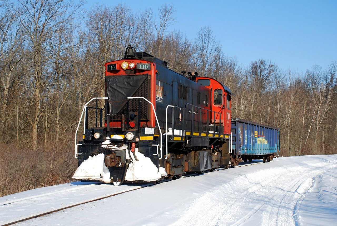 Trillium Railway 110 pulls a gon out of Feeder Yard and heads for Welland to start the days switching.