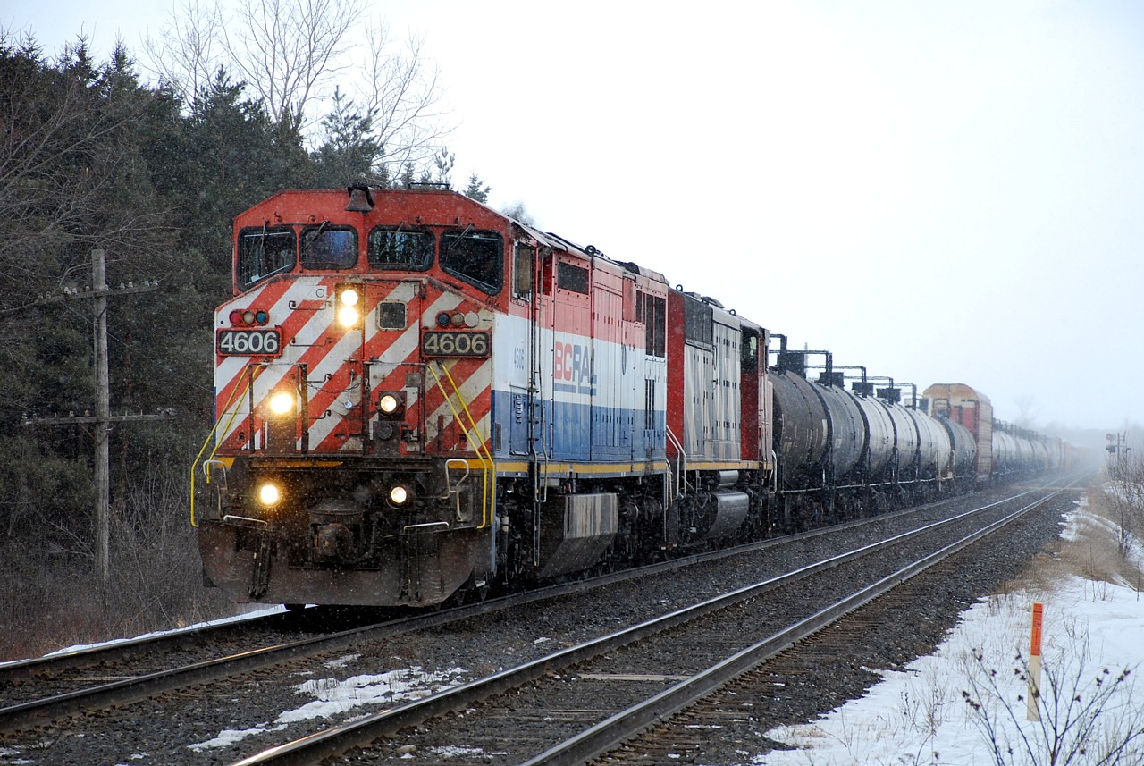 CN 385 approaches Bethel Church Road on the east side of Brantford during a brief snow squall.