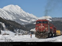 With Mt. Erickson looking on, the CP Cranbrook crew give a PK to the CP9701-8952-8579 as it departs Crowsnest Yard bound for Kipp Yard near Lethbridge, AB.