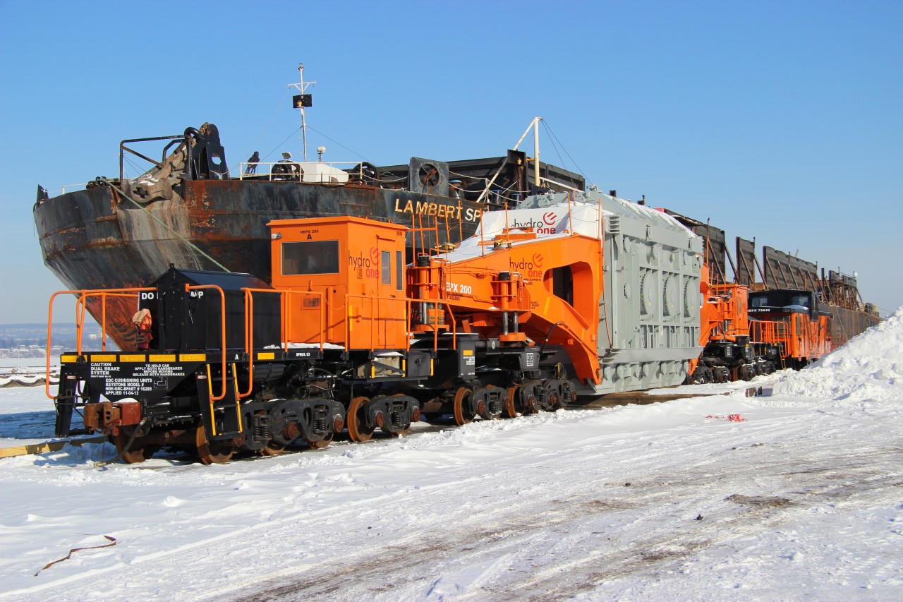 Having spent a better part of the winter in the Port of Hamilton. HEPX 200 is being prepared for a move to the Southern Ontario Railway yard.