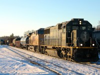 IC 1009 - UP 5998 lead 330 through Brantford on the north track. A late running #76 with VIA 903 leading can be seen arriving for it's station stop on the south