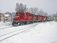 T08 with a mix of past and present power rolls through light flurries in Myrtle Station Ontario.