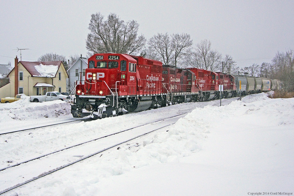 T08 with a mix of past and present power rolls through light flurries in Myrtle Station Ontario.