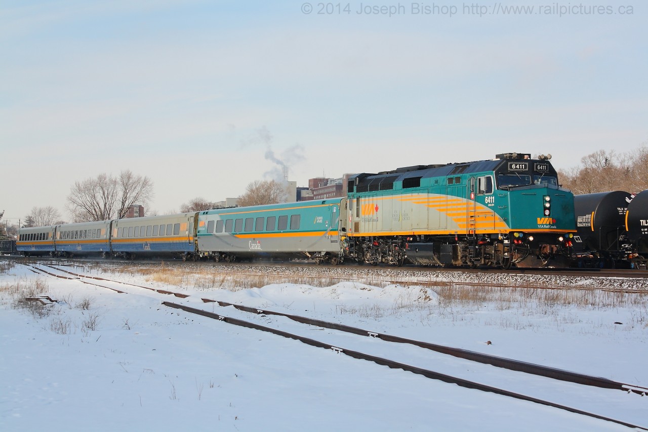 New VIA Rail Club Car.  Via 6411 leads train 72 towards its station stop at Brantford with a recently rebuilt club car directly behind the locomotive.  The car is number 3459.