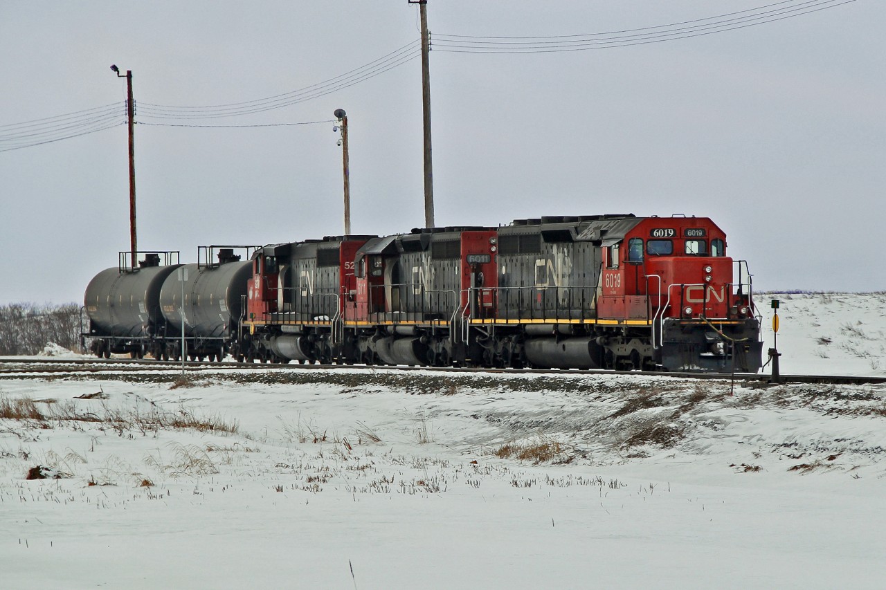 More power than loads!  SD40-2(W) 5277 and SD40u 6011 and 6019 switch tank cars at the east end of CN's Scotford Yard.