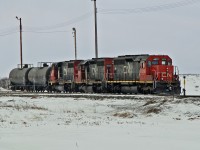 More power than loads!  SD40-2(W) 5277 and SD40u 6011 and 6019 switch tank cars at the east end of CN's Scotford Yard.