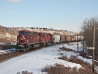 Approaching Keith yard, but not stopping, this grain train is on it's way out of Calgary. 