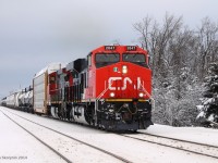 Brand new CN ES44AC! On point of an extra 301 mixed freight, one of the brand new ordered Evolution Series 4400 horsepower Alternating Current (ES44AC) engines leads another GE, past Heritage Road just east of Georgetown near Peru, ON. This is also my first CN ES44AC ever caught. Units were: CN 2847-CN 2668.