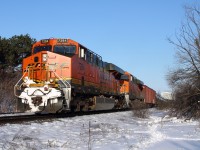 As evening of this Saturday approaches, I get a timely notification that train U711 with 2 BNSF locomotives just passed Oshawa, giving me an hour or so to get trackside, having 2 elly style Burlington Northern Santa Fe locomotives. As I decide to waste some time, I make it trackside just in time to get my settings right on the DSLR, and snap a photo. This is also my first "FPON" locomotive leading.