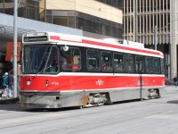 On 2014 "Family Day", TTC route 505 bound for Dundas west station passes by the Art Gallery Of Ontario.