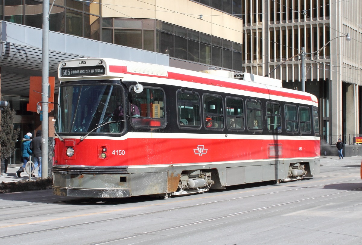 On 2014 "Family Day", TTC route 505 bound for Dundas west station passes by the Art Gallery Of Ontario.