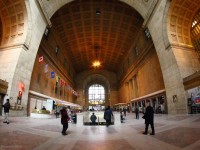 In the Great Hall of Toronto's Union Station on Family Day 2014, we see lots of people and families rushing off or on their trains to begin or end their journey via rail.
