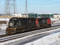 A powermove consisting of a CN GE, and IC SD70 still showing its black IC color, passes Snider heading to go rescue a stalled 302 at Langstaff on the Canadian National Bala subdivision, pulling it back to Mac yard with the IC leading. Unfortunately, I did not stay as long to see it and will not have any photos.