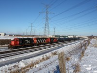 On a nice, sunny Saturday CN 541 rolls by Snider, just diverging off of the Canadian National Newmarket subdivision, which is that rusty bridge passing over the mainline in the background, bringing just a few oil cars to Macmillan yard.