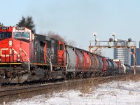 A Westbound Canadian National mixed freight train is led by a GE and a SD75I past one of my favorite locations, New Westminster Drive in Thornhill. CN 149 with BCOL 4626 leading was taking a long time to get to me, so I decided to leave before photographing it.