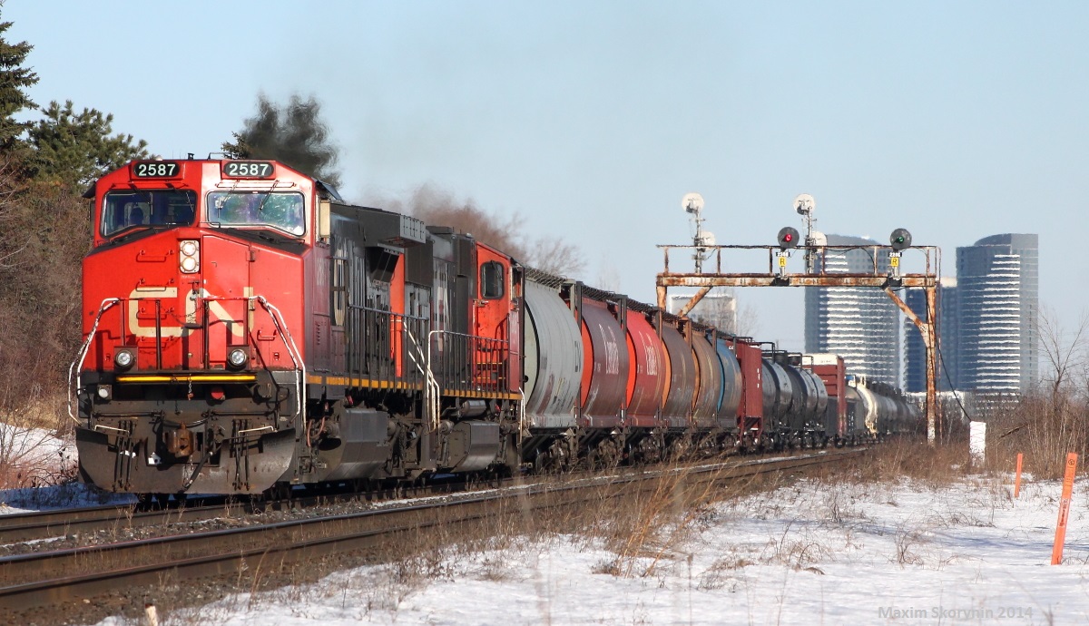 A Westbound Canadian National mixed freight train is led by a GE and a SD75I past one of my favorite locations, New Westminster Drive in Thornhill. CN 149 with BCOL 4626 leading was taking a long time to get to me, so I decided to leave before photographing it.