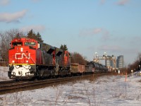 CN X314 is hauled by 2 "beast" back to back SD70M-2's, in perfect evening light just before my bus ride home arrives.