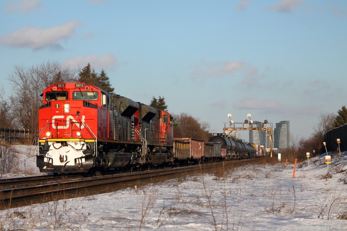 CN X314 is hauled by 2 "beast" back to back SD70M-2's, in perfect evening light just before my bus ride home arrives.