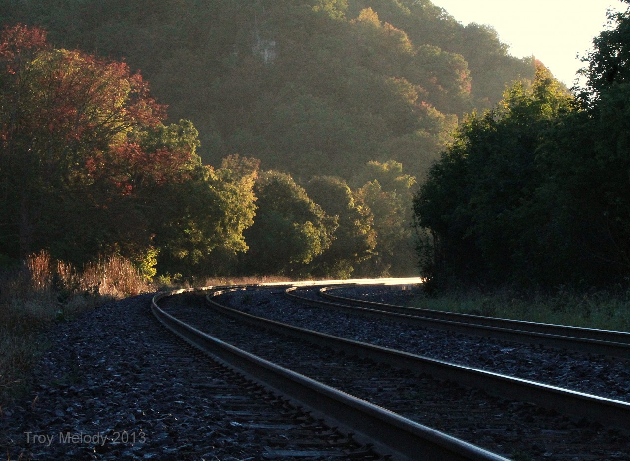 The first light of the day reflects of the rails of the Dundas sub. in a few moments VIA 82 will make an appearance on its way to Toronto from Windsor.

Image taken at the former site of the Dundas passenger station. (Mile 4.7 Dundas sub.)