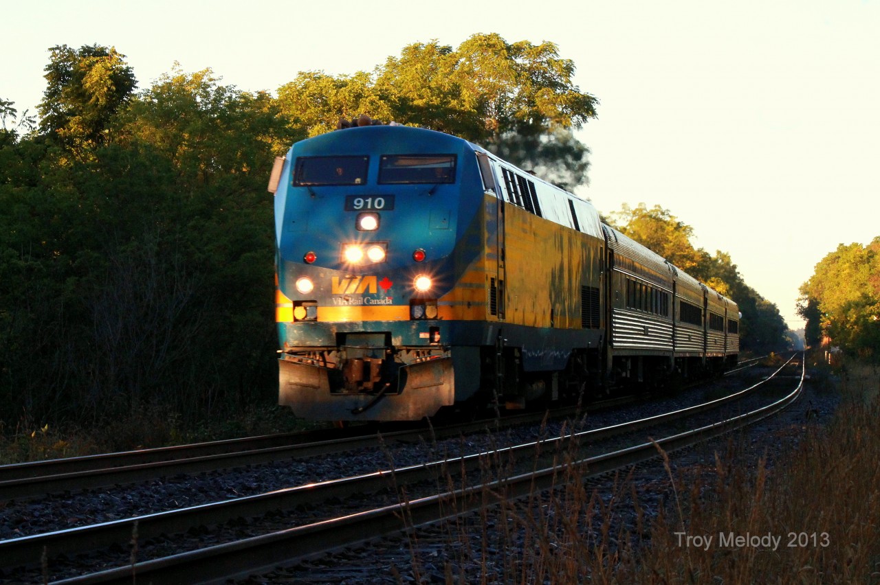 VIA Rail Canada GE P42 DC 910, leads VIA 82 through the city Dundas, during the first light of the day. VIA 82 is on route from Windsor to Toronto.