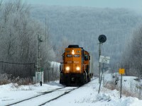 ONR GP 38-2 #1801 finishes switching at Arclin on a frosty morning and heads back to the ONR yard with 2 hoppers in tow. 02/20/2014 