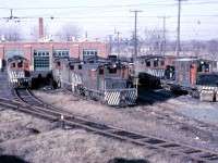 Two friends and I drove to Oshawa to get photos of the Oshawa Railway after it was reported that CN (owner of OR) was going to convert to diesels. The Oshawa Railway connected to both CNR and CPR lines that ran through Oshawa, and switched various industries including a number of different GM automotive plants located in the town. Pictured here are the OR's Hillcroft Street shops in 1962, full of electric motors used in freight service and various pieces of maintenance of way equipment. Two years later, electric operations in Oshawa would cease in May of 1964.