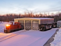 Sitting in high idle outside the barn, OSRX 1210 is alive and well again after dumping her water this morning.