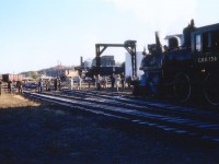 On an excursion to Owen Sound and return over Thanksgiving 1974, I noted in the morning as the locomotives Credit Valley #136 and 1057 (barely visible next to the CP diesel background) were getting their load of coal for the return trip, that everyone else was taking pictures of 136 so I decided to take pictures of everyone else. I'd like hopefully some of the crowd are on RP., but this photo is 40 years old this year. Purpose of this photo is to show that there was once a lot of railroad activity in Owen Sound; not only on CP, but also on CN right across the harbour. Sad to see the decline over the years. Chilly morning; not the frost on the rails. This turned out to be an eventful day. Poor quality coal wouldn't burn. I did not get back home to St. Catharines until almost 0700 Monday; a full 22½ hours after leaving 'The Sound'.