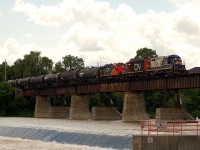 RLK 1755 - CN 7068 - CN 7076 leading an eastbound extra over the grand river in Caledonia, ON